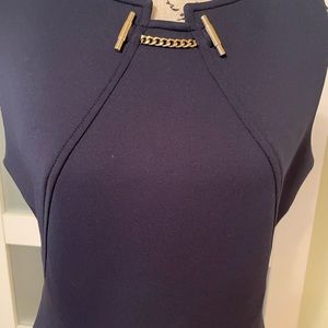 Navy blue color. Dress worn once and dry clean.